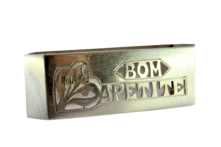 Argola de guardanapo em prata com recortes e dizeres "Bom Apetite".